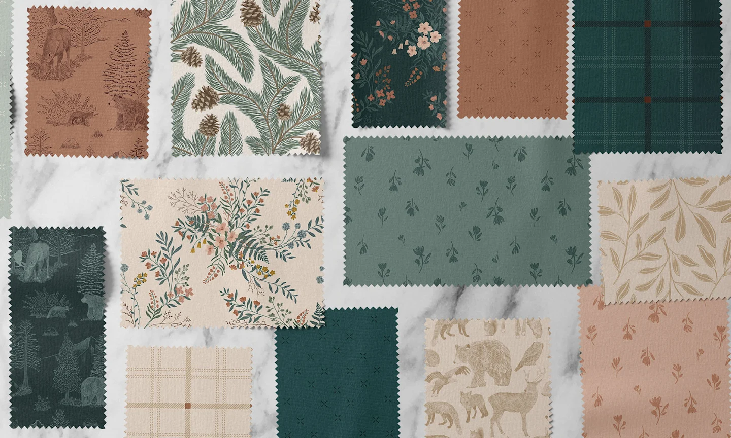 Cut out pieces of fabric in designs from the awaiting Alaska collection.