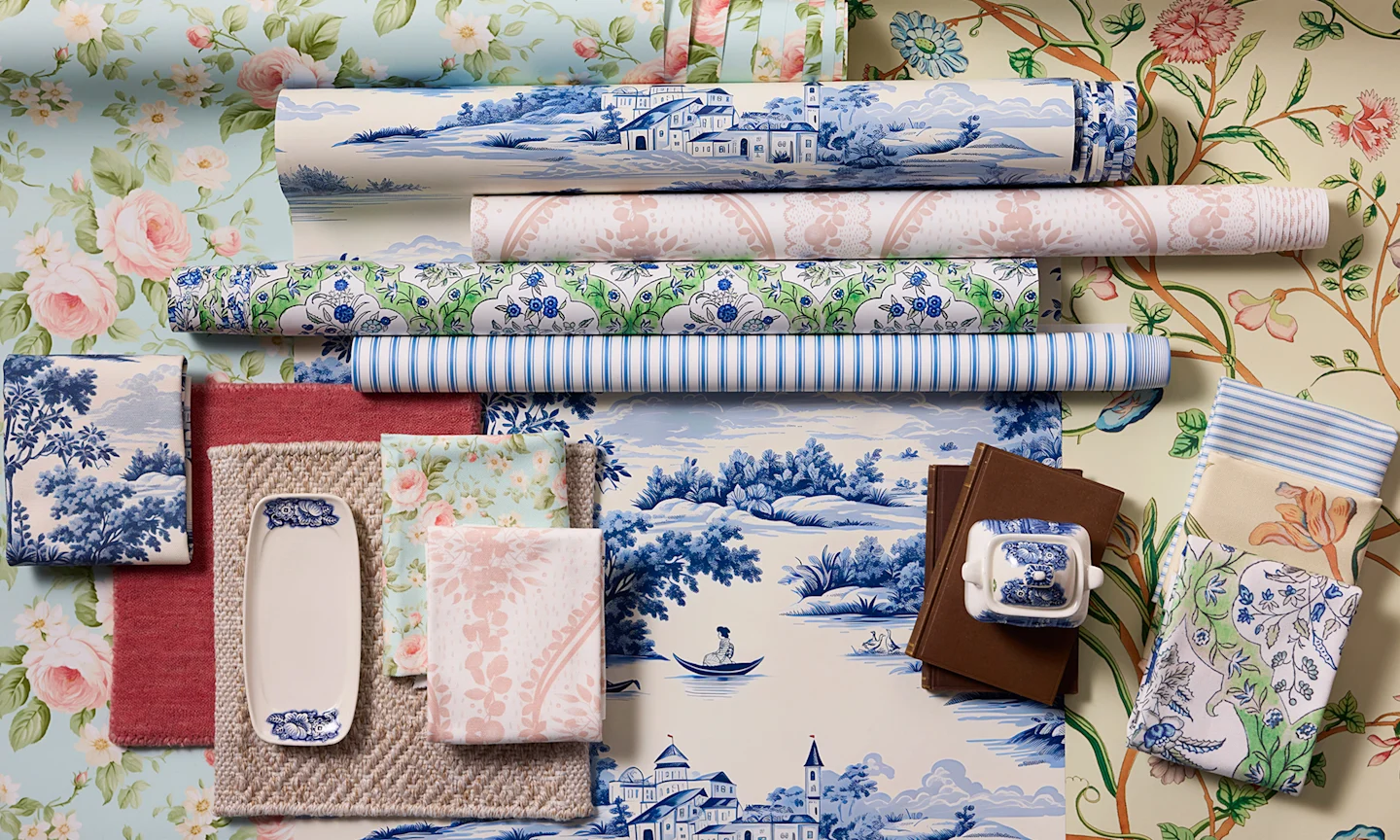 Rolls of english country wallpaper styled together.