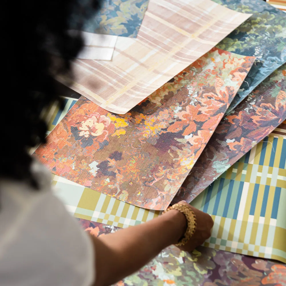 Artist hand painting flowers