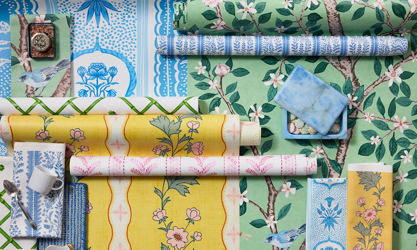 Rolls of southern maximalism style wallpapers.