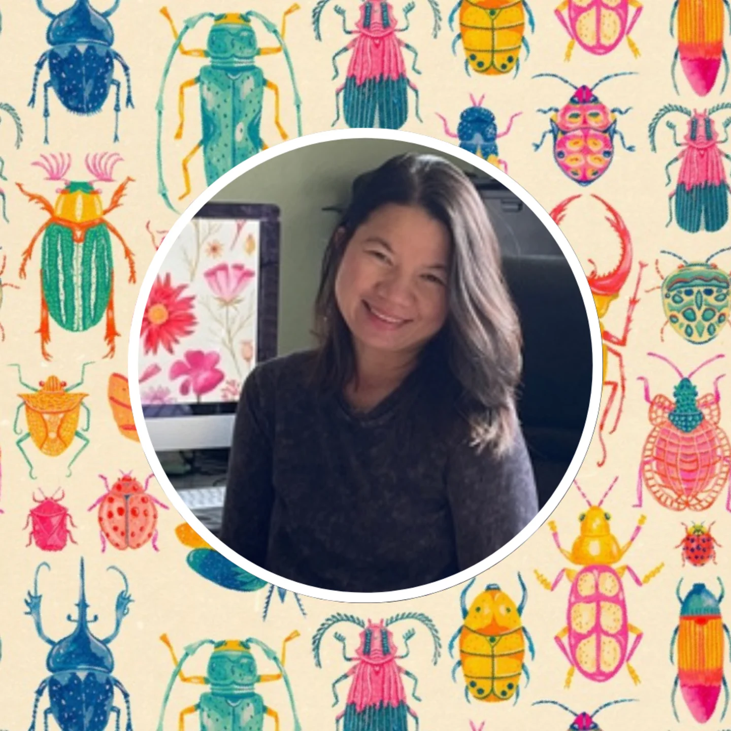 Headshot of Spoonflower artist Grace Andersson in front of one of her designs.